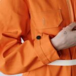 Fashionable Workwear - A Person Wearing Orange Jumpsuit